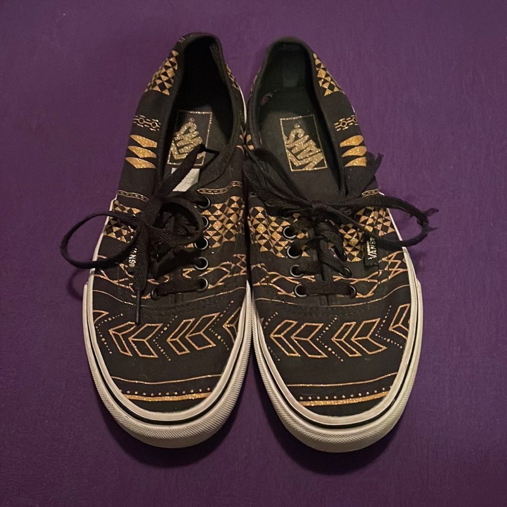 Vans women’s size 9, men’s size 7.5, black and gold